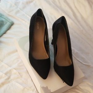 Black suede pumps